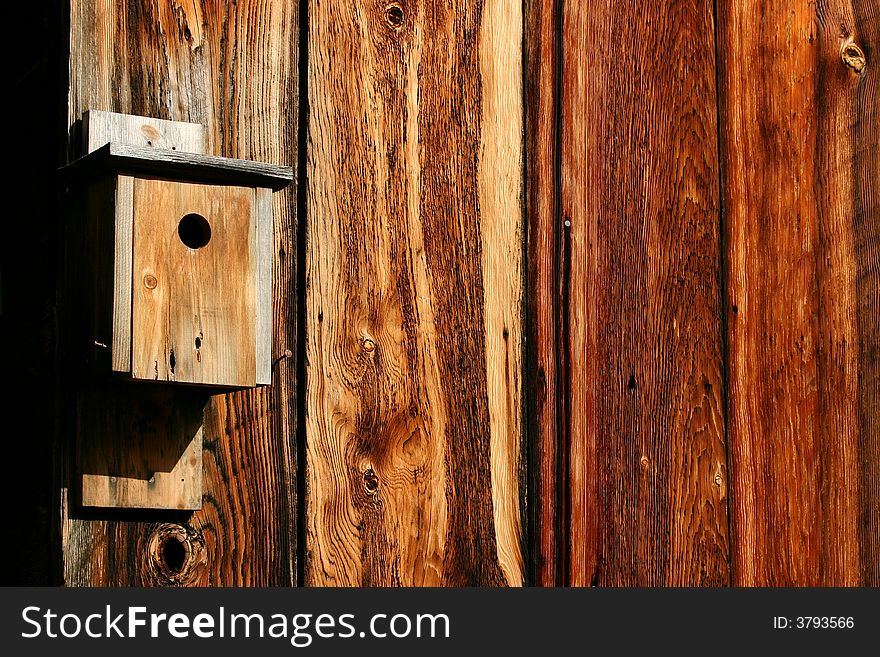 Old bird house on old but colorful barn wood located at Golden, Oregon (old ghost town). Old bird house on old but colorful barn wood located at Golden, Oregon (old ghost town)