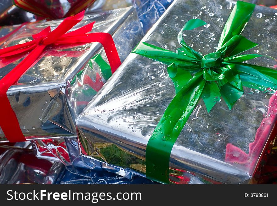 Presents wrapped in silver paper