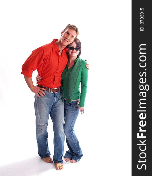 Young adult couple wearing red and green. Young adult couple wearing red and green