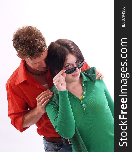 Young adult couple wearing red and green. Young adult couple wearing red and green