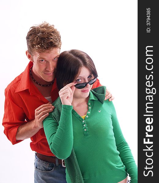 Young adult couple wearing red and green. Young adult couple wearing red and green