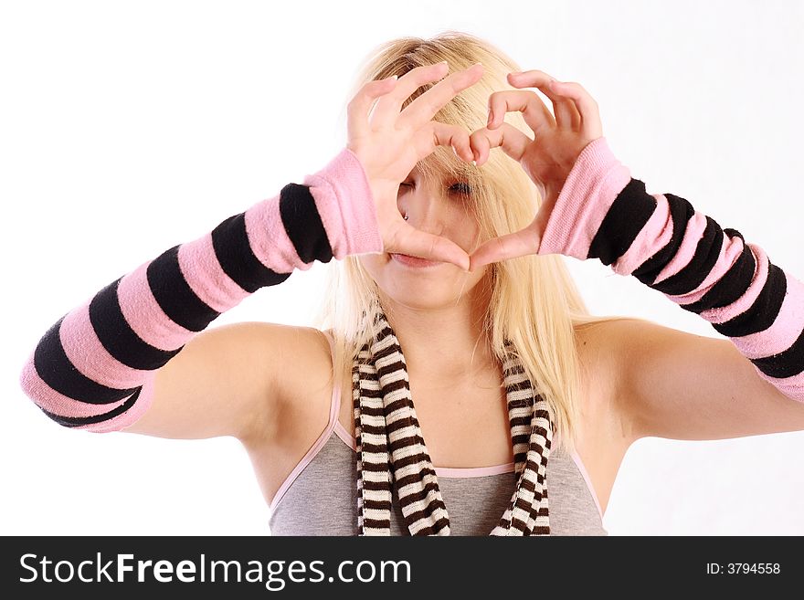 Girl with hands shaping heart