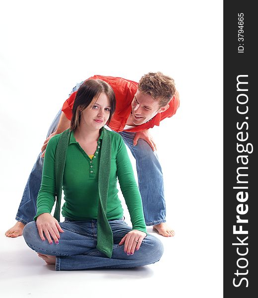 Young adult couple wearing red and green. Young adult couple wearing red and green