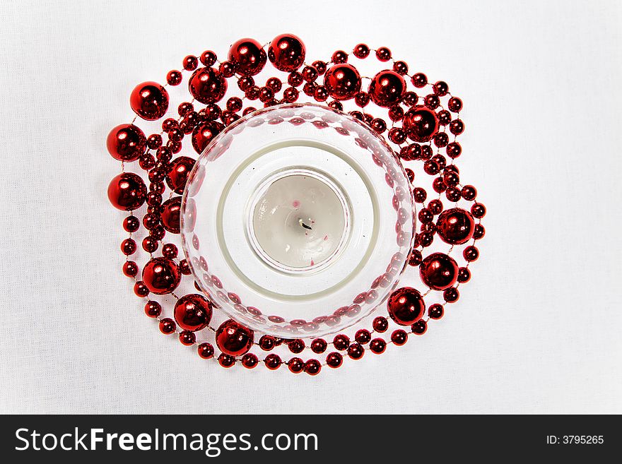 Red glass bowl with red necklace. Red glass bowl with red necklace