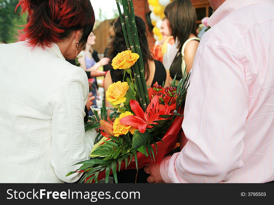Beautiful and bright bouquet flowers on cheerful wedding