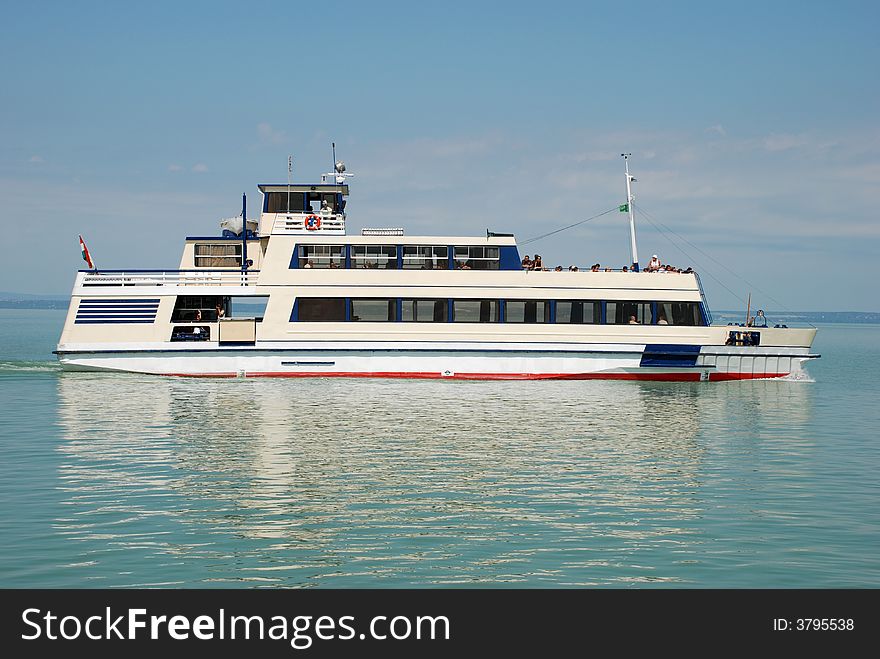 Cruiser ship with travellers - summertime