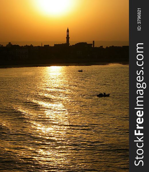 Silhouette of mosque along the Nile River at sunset. Silhouette of mosque along the Nile River at sunset