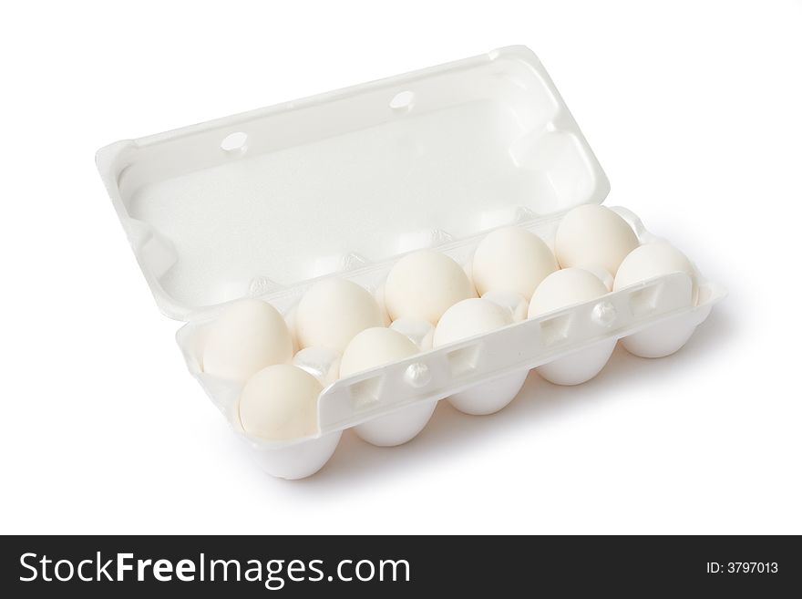 Eggs on egg lifting tray, on white background