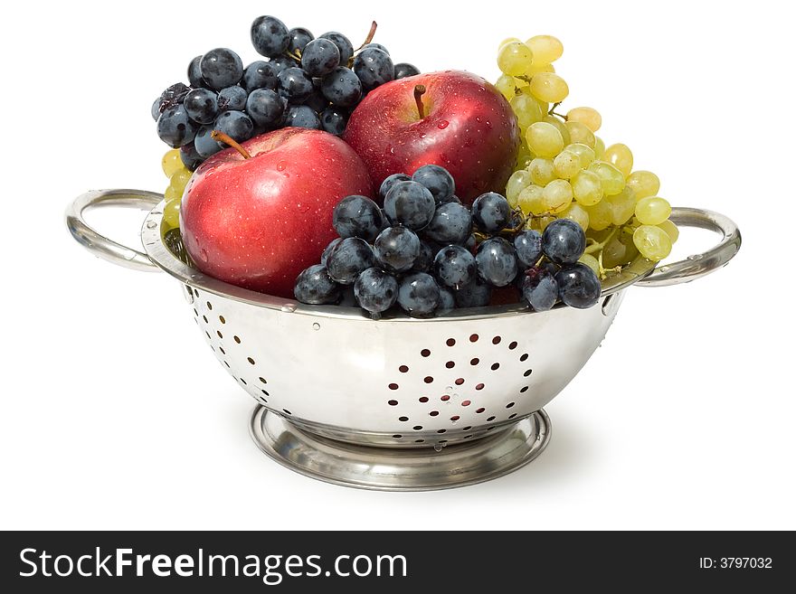 Colander with fruits on white background. Healthy food image series. Colander with fruits on white background. Healthy food image series