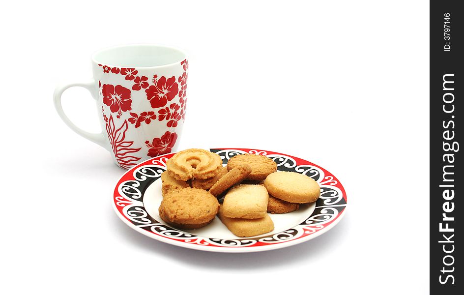 Cookies and cup isolated on a white background. Cookies and cup isolated on a white background.
