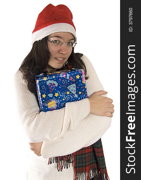 Girl holding tight her christmas gift. Girl holding tight her christmas gift