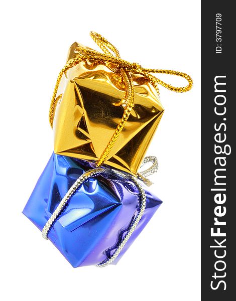Golden and blue gift boxes isolated over white background