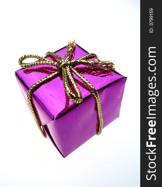 Usual gift box of violet color on  white background. Usual gift box of violet color on  white background