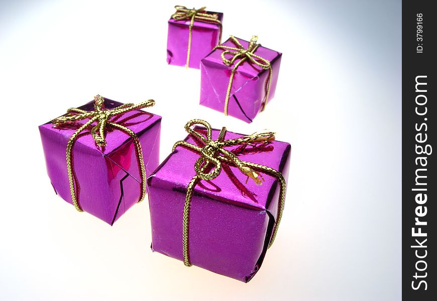 Usual gift boxes of violet color on  white background. Usual gift boxes of violet color on  white background