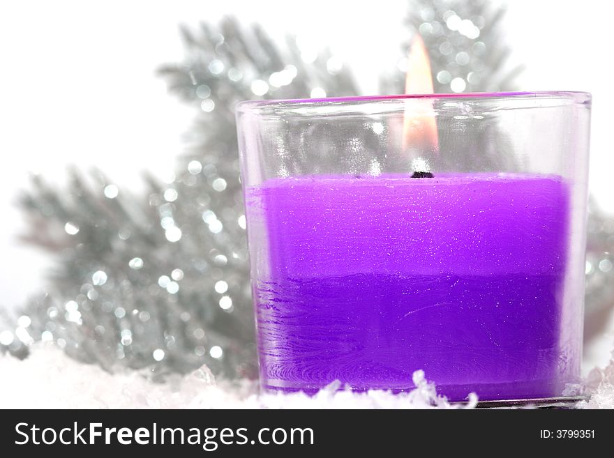 Festive new-year candle with snow