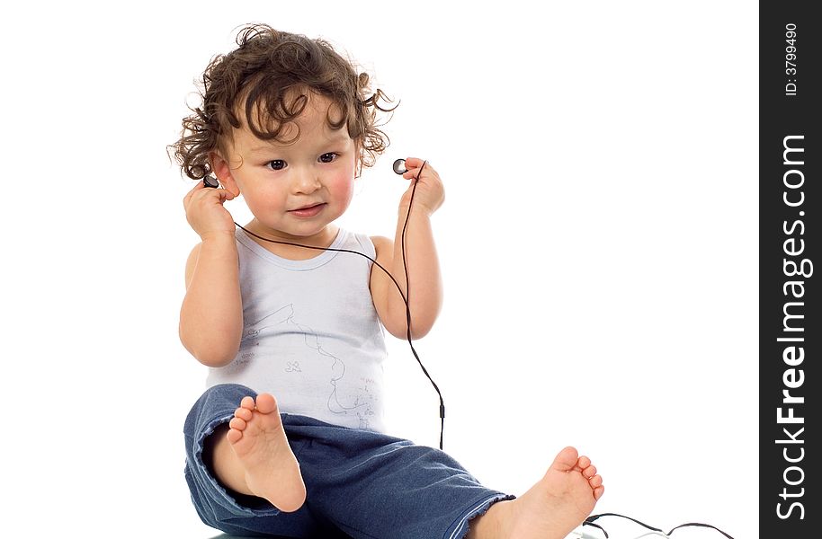 Child with headphones,isolated on a white background. Child with headphones,isolated on a white background.