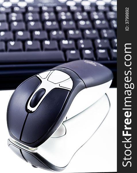 Computer mouse with shadow and keyboard. Computer mouse with shadow and keyboard.