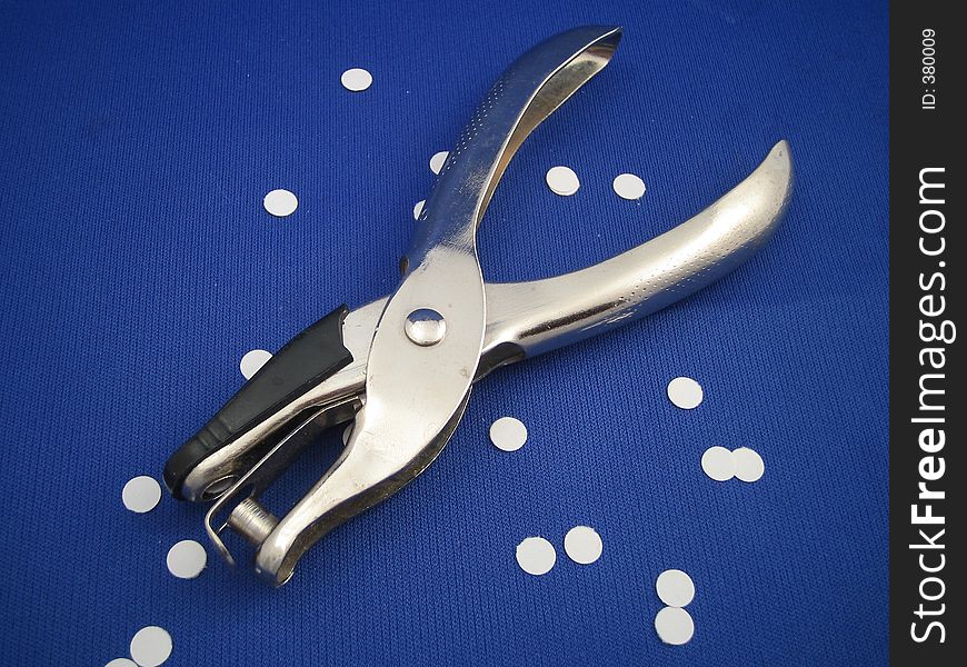Closeup of paper hole puncher