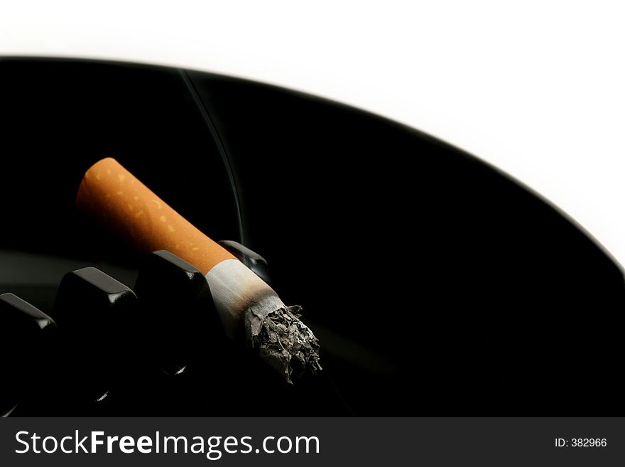 Cigarette in ashtray