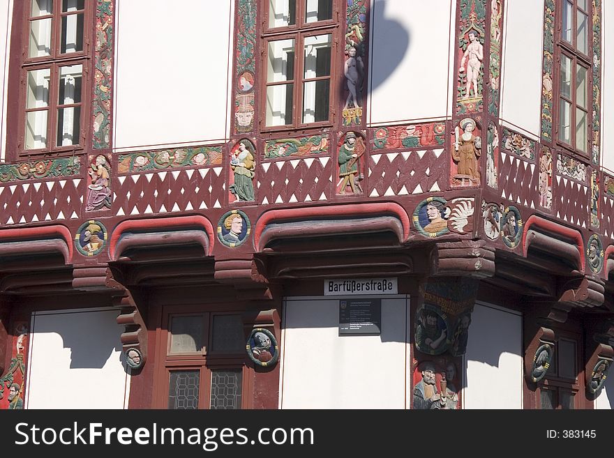 Figures on a half-timbered house in Germany. Technical details: Canon EOS 300D, 18-55mm lens at 50mm, 1/160s, f/11, 100 ASA, shot in RAW format.