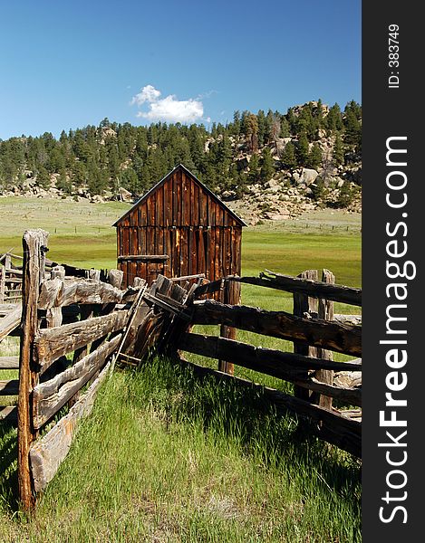 Old wooden shed standing in mountain meadow. Old wooden shed standing in mountain meadow