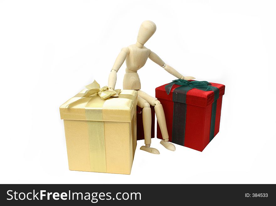 Manikin with gifts over white. Manikin with gifts over white