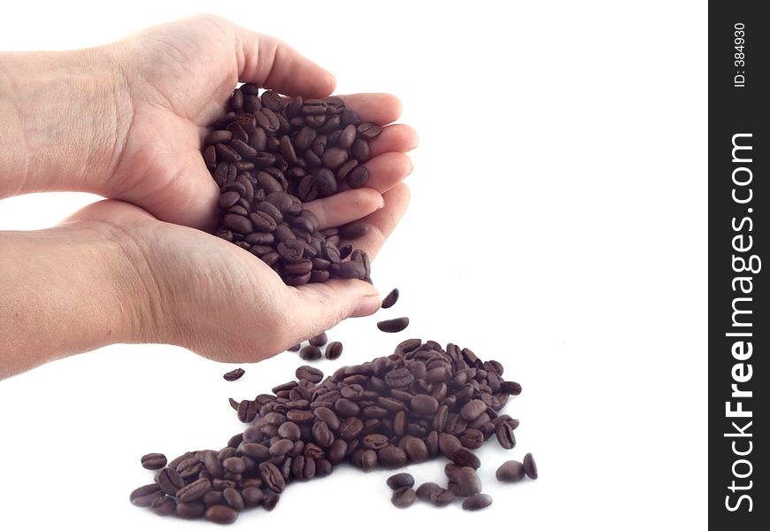 Isolated hand and coffee beans. Isolated hand and coffee beans