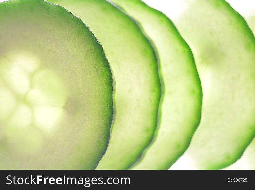 Close-up sliceds of cucumber.