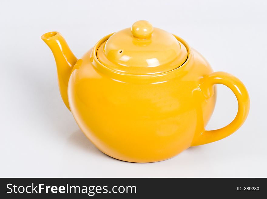 An orange teapot. An orange teapot