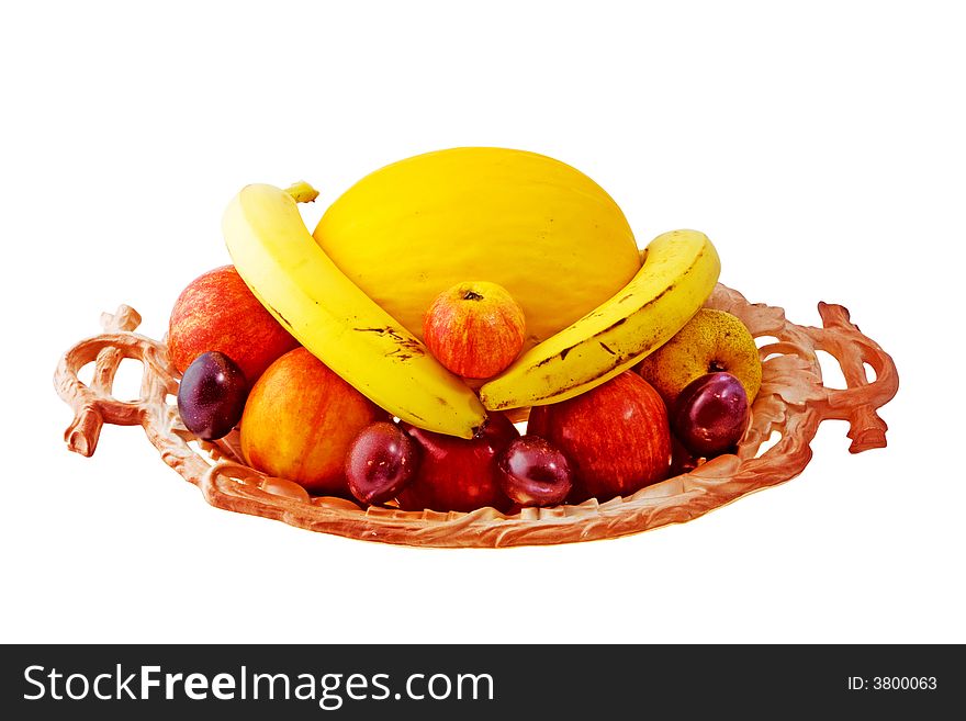 Bowl of fresh fruit, isolated on a white background with clipping path. Bowl of fresh fruit, isolated on a white background with clipping path.