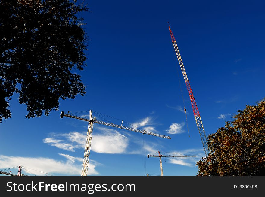 New Crain construction On jod site with blue sky. New Crain construction On jod site with blue sky