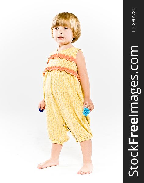 Three year old girl in a yellow outfit. Three year old girl in a yellow outfit