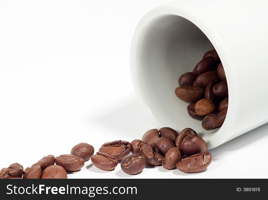 Coffee background: Close-up of a beans, cup