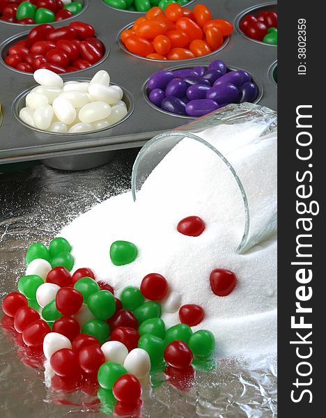 Christmas candy with a bowl of spilled sugar. Christmas candy with a bowl of spilled sugar.