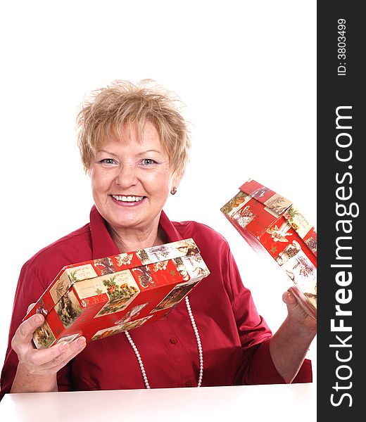 Smiling woman with christmas presents. Smiling woman with christmas presents.