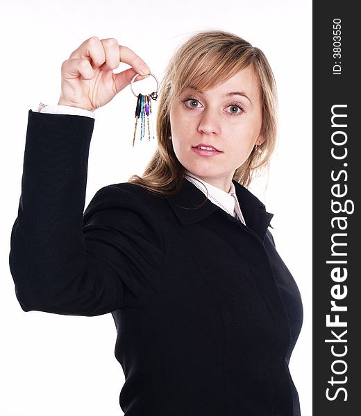 Happy blond woman in black suit with keys. Happy blond woman in black suit with keys