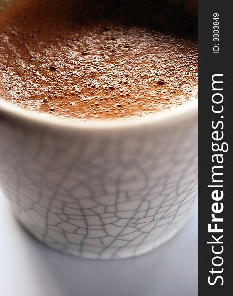 A close up image of an espresso coffee. A close up image of an espresso coffee