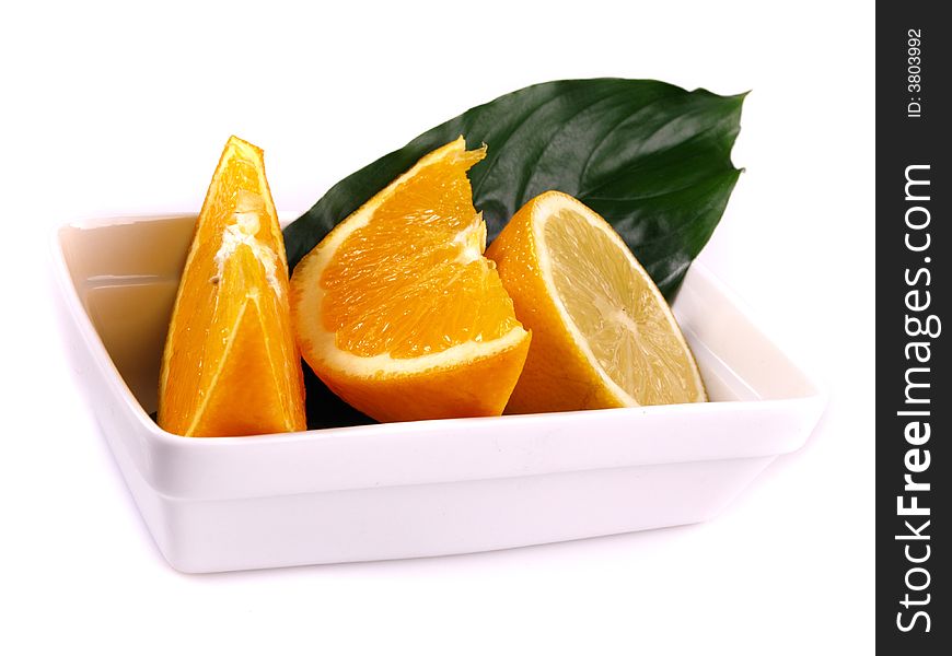 Juicy oranges, lemon and green leaf. Juicy oranges, lemon and green leaf