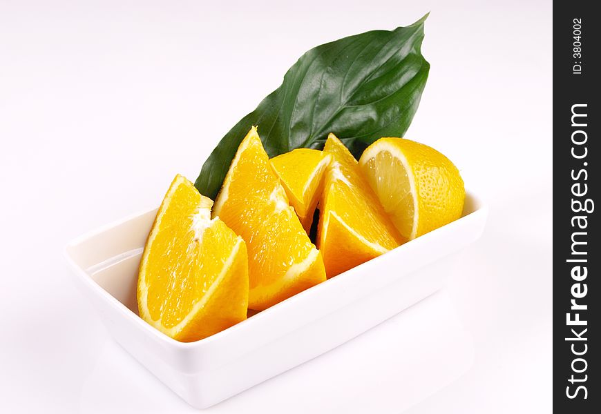 Oranges, lemon, leaf