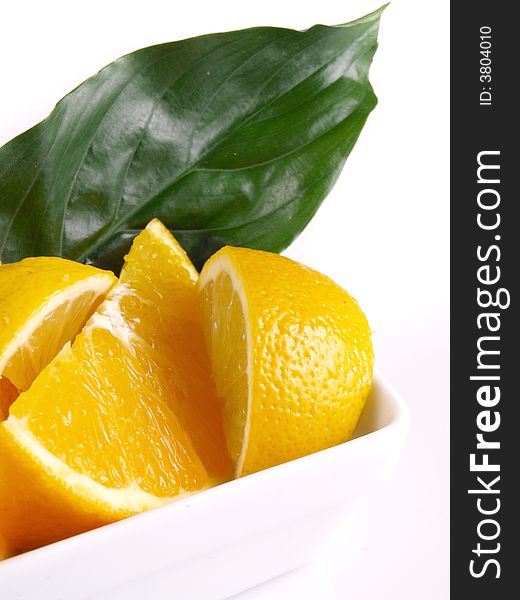 Juicy oranges, lemon and green leaf. Juicy oranges, lemon and green leaf