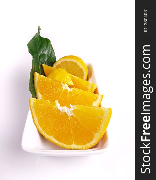 Oranges, lemon, leaf