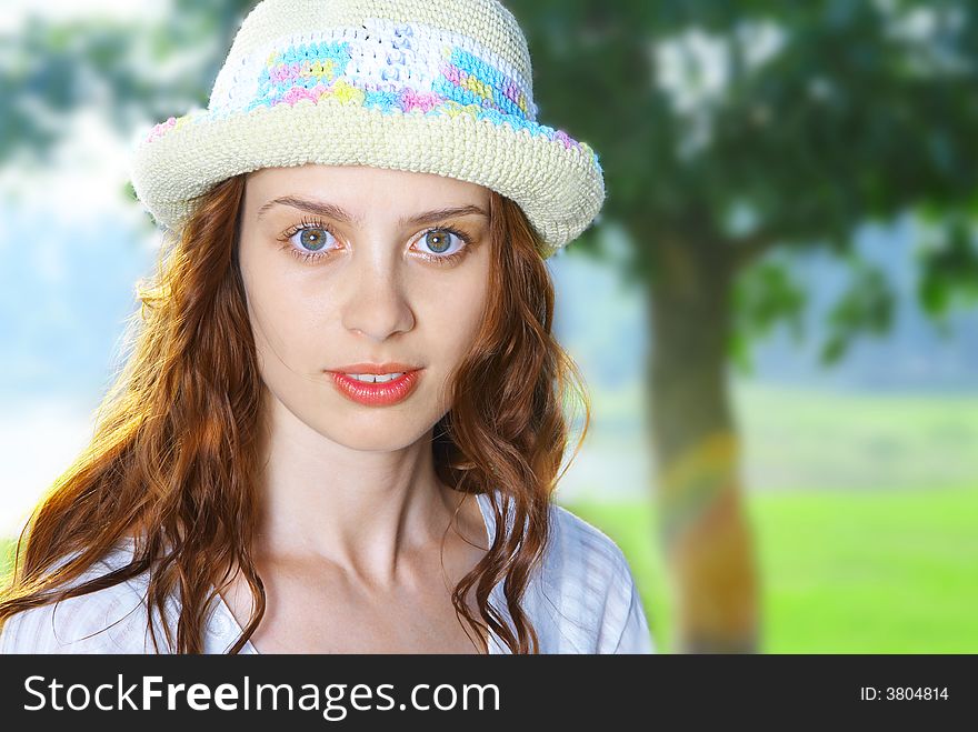 Portrait of nice redhead girl in summer environment. Portrait of nice redhead girl in summer environment