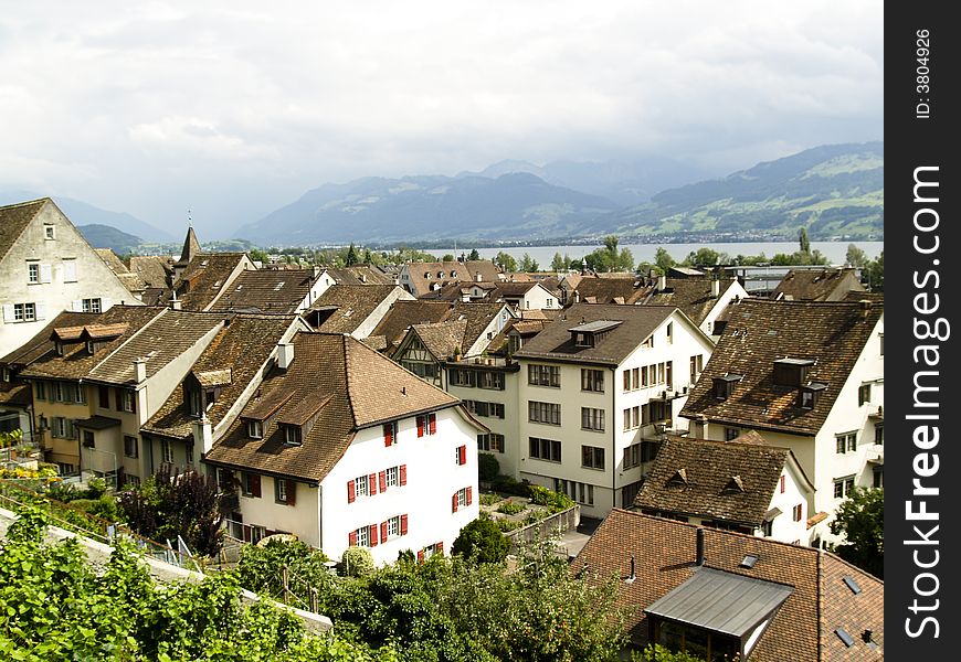 Rapperswil brown roofs in background zurich lake.