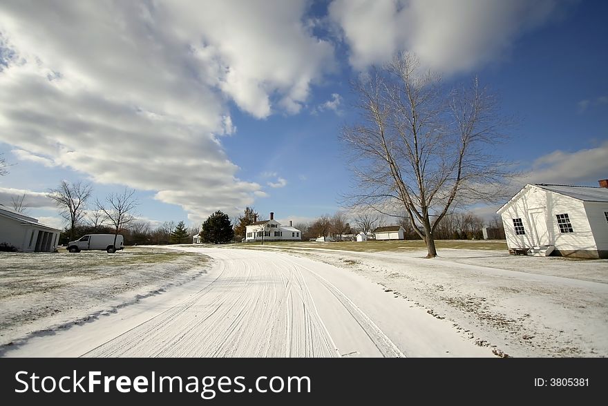 Snow covered country road during winter season. Snow covered country road during winter season
