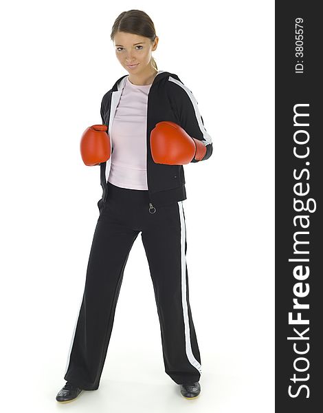 Young beauty with boxing gloves. Smiling and looking at camera. White background. Whole body, front view. Young beauty with boxing gloves. Smiling and looking at camera. White background. Whole body, front view