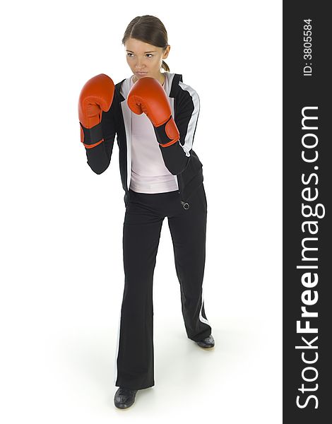 Young beauty with boxing gloves. Holding hilt-guard and looking at something. Isolated on white in studio. Whole body, front view. Young beauty with boxing gloves. Holding hilt-guard and looking at something. Isolated on white in studio. Whole body, front view