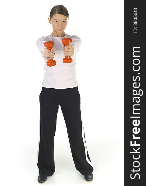 Young woman working out with dumbbells. Looking at camera. Isolated on white in studio, front view. Whole body. Young woman working out with dumbbells. Looking at camera. Isolated on white in studio, front view. Whole body