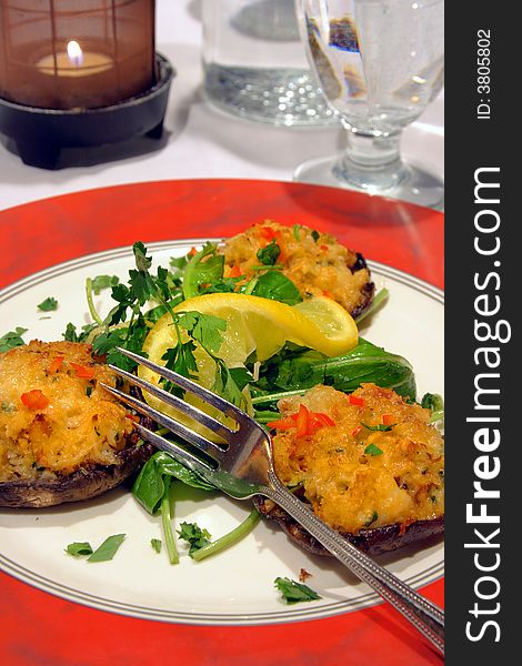 Crab cake appetizer in a classy fine dining restaurant. Crab cake appetizer in a classy fine dining restaurant