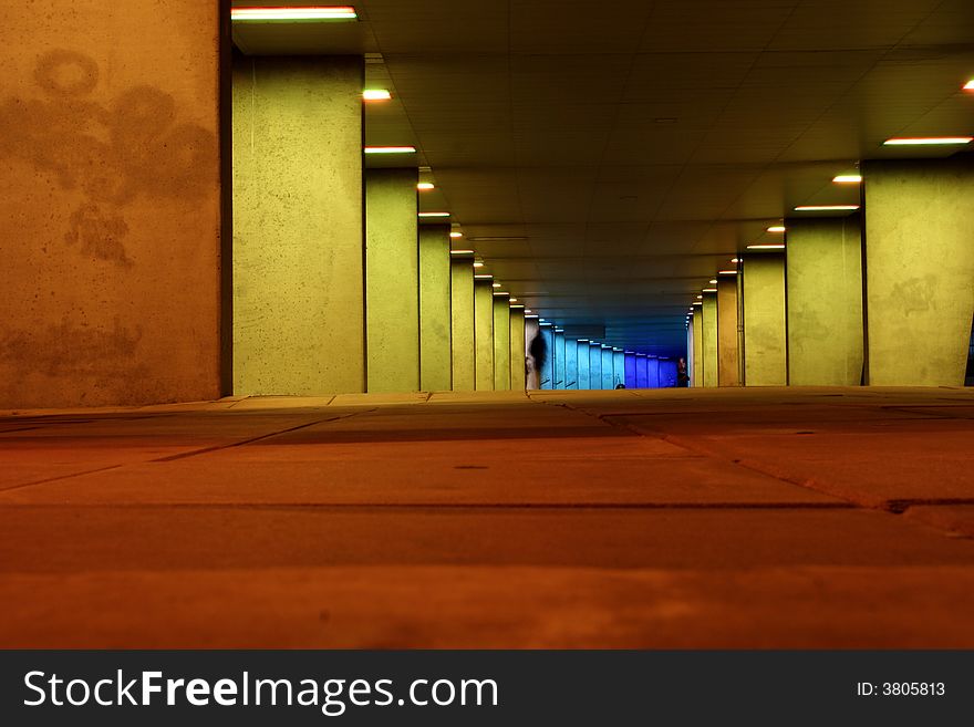 Man walking through the nai tunnel. Man walking through the nai tunnel