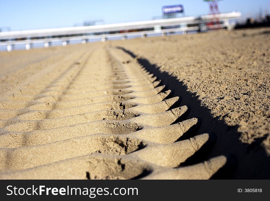 Track of a tractor in the sand. Track of a tractor in the sand
